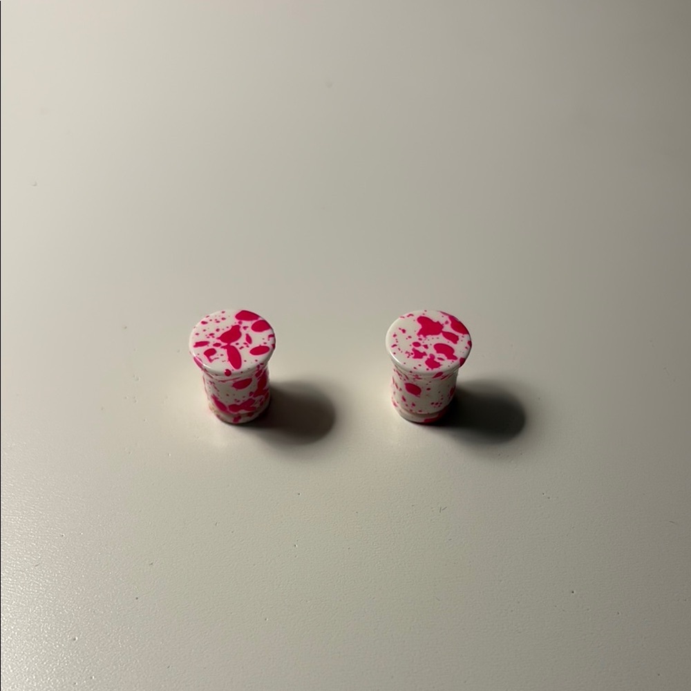 Pink and White Splatter Plugs
